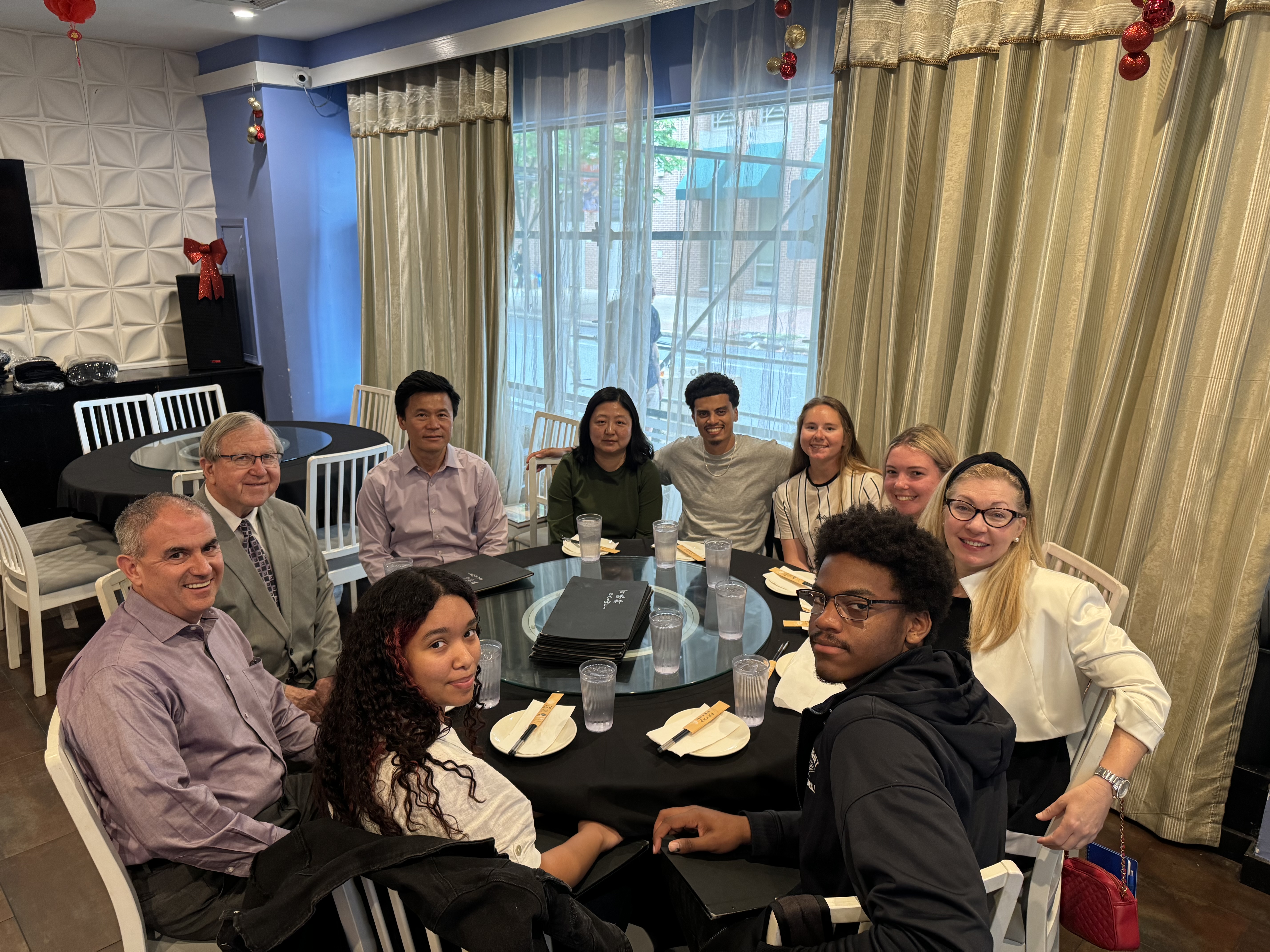 Rosemont students meet with Asian Bank officers.