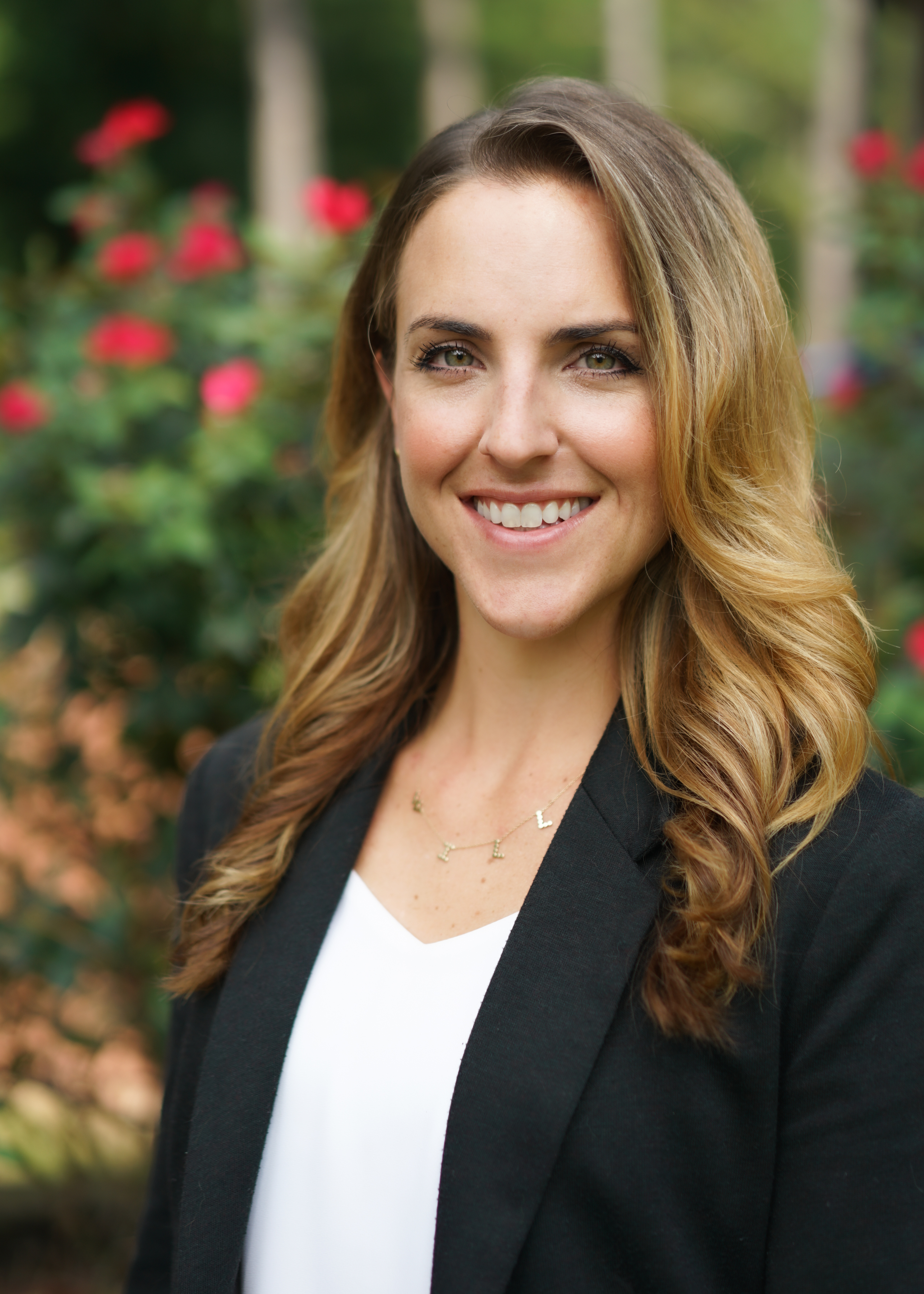 Professional headshot for Danielle Bieber, an adjunct professor for the graduate counseling program at Rosemont College. She is a white woman with light brown hair.