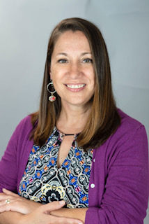 Headshot of Kathy Richardson. She is white with brunette hair.